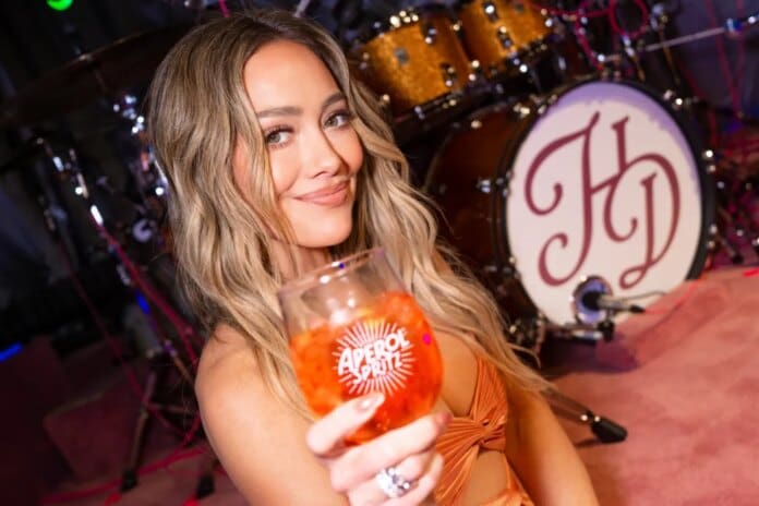 hilary-duff-aperol-spritz-billboard-1800.jpg
