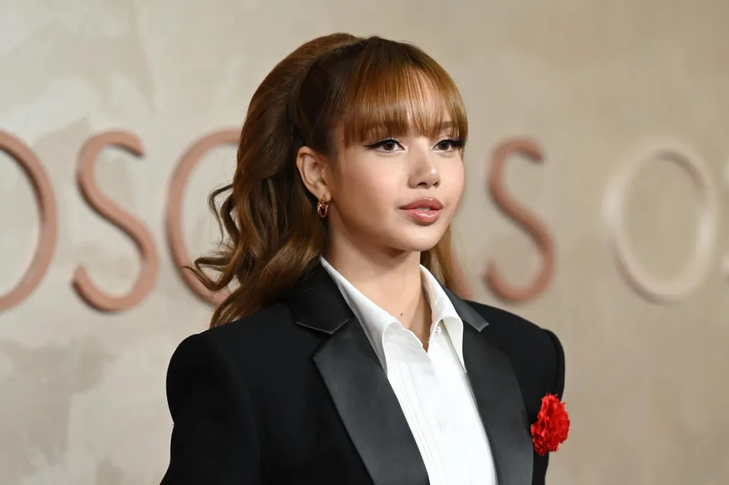 BLACKPINK’s LISA Says Group Has to ‘Hide When We’re Dating’